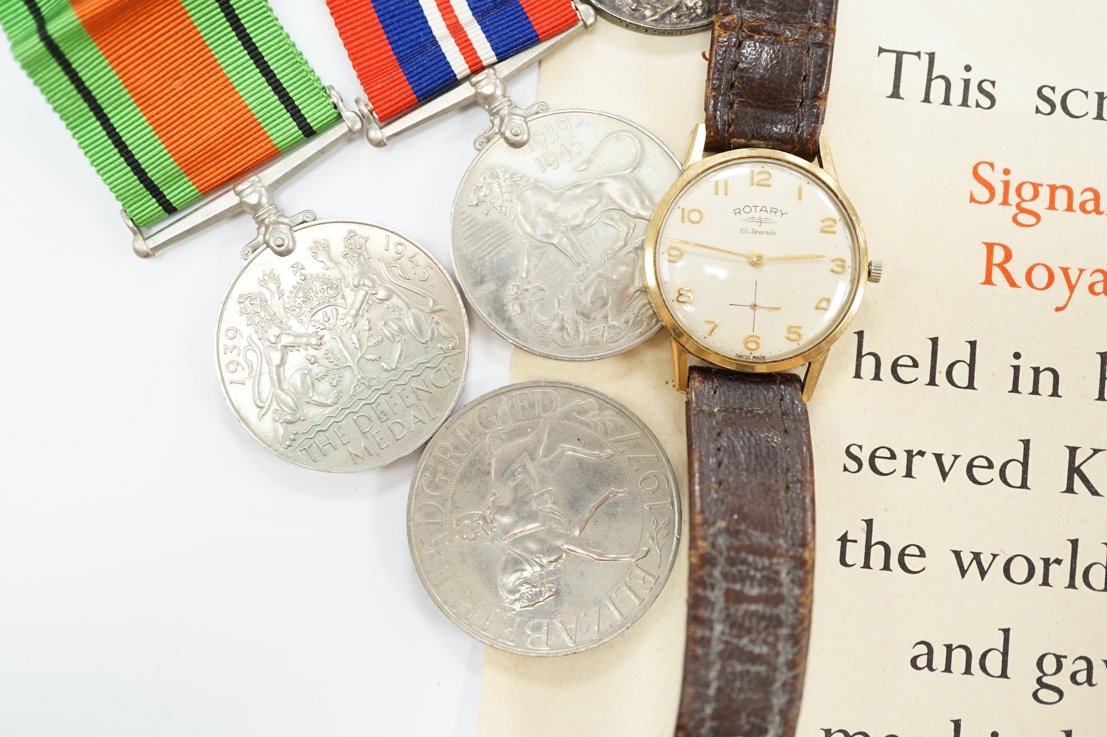 A WWII medal group awarded to Signalman H.H. Rogers, Royal Corps of Signals, comprising; a Pacific Star, a 1939-1945 Star, a Defence Medal and a 1939-1945 War Medal, together with the related note detailing the awards is